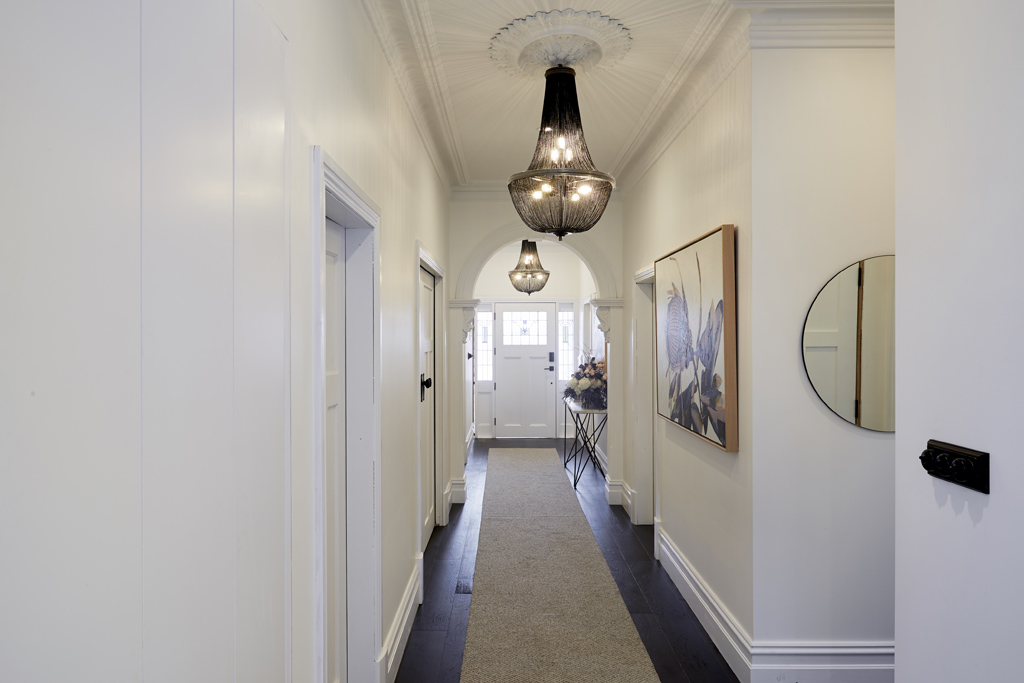 Ronnie & Georgia's hallway has a sense of drama & understated elegance & we totally agree